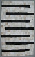 Ковёр 0,70х1,40 из кусочков шкур коров L-103 беж/блэк 2013